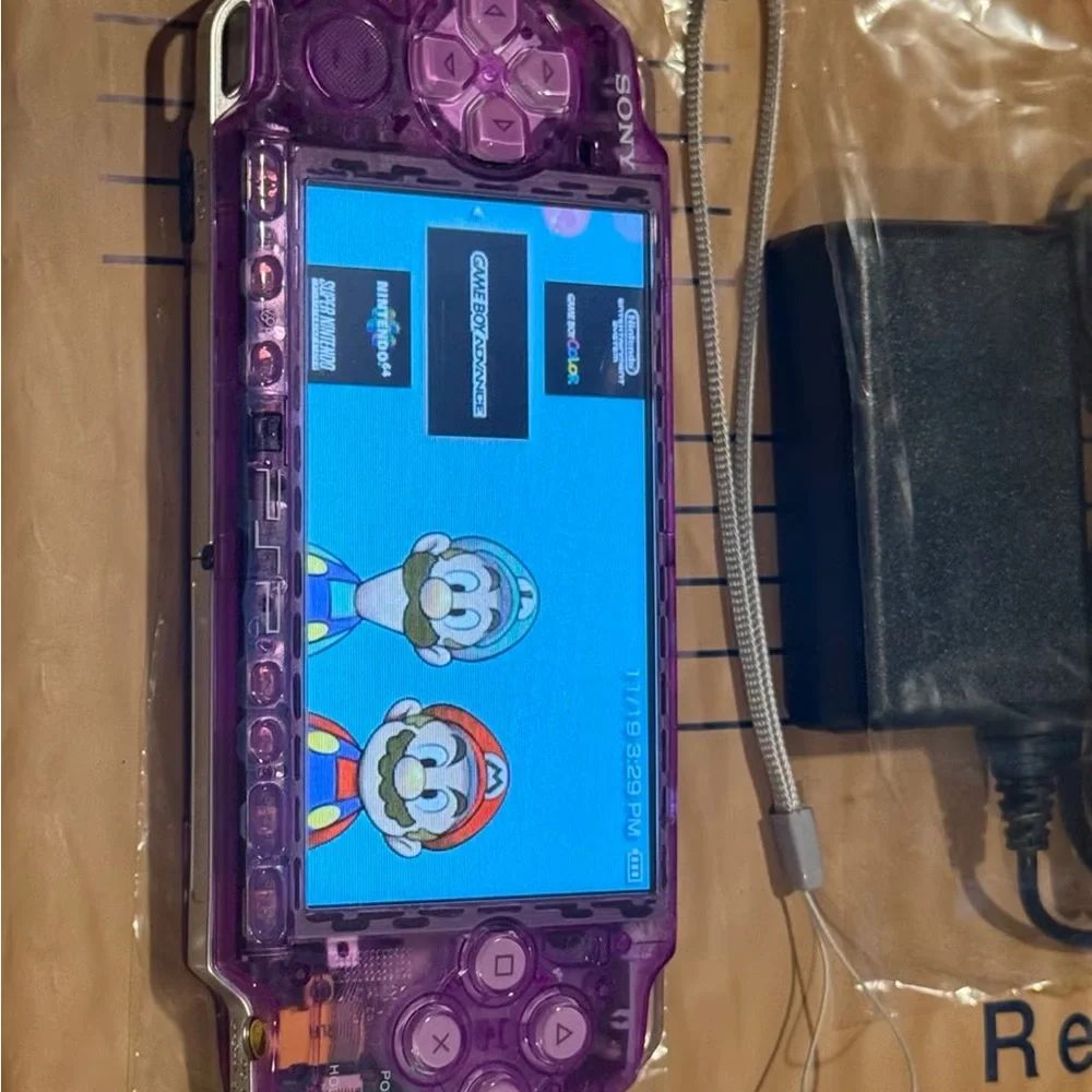 Sony Handheld Console in Transparent Purple